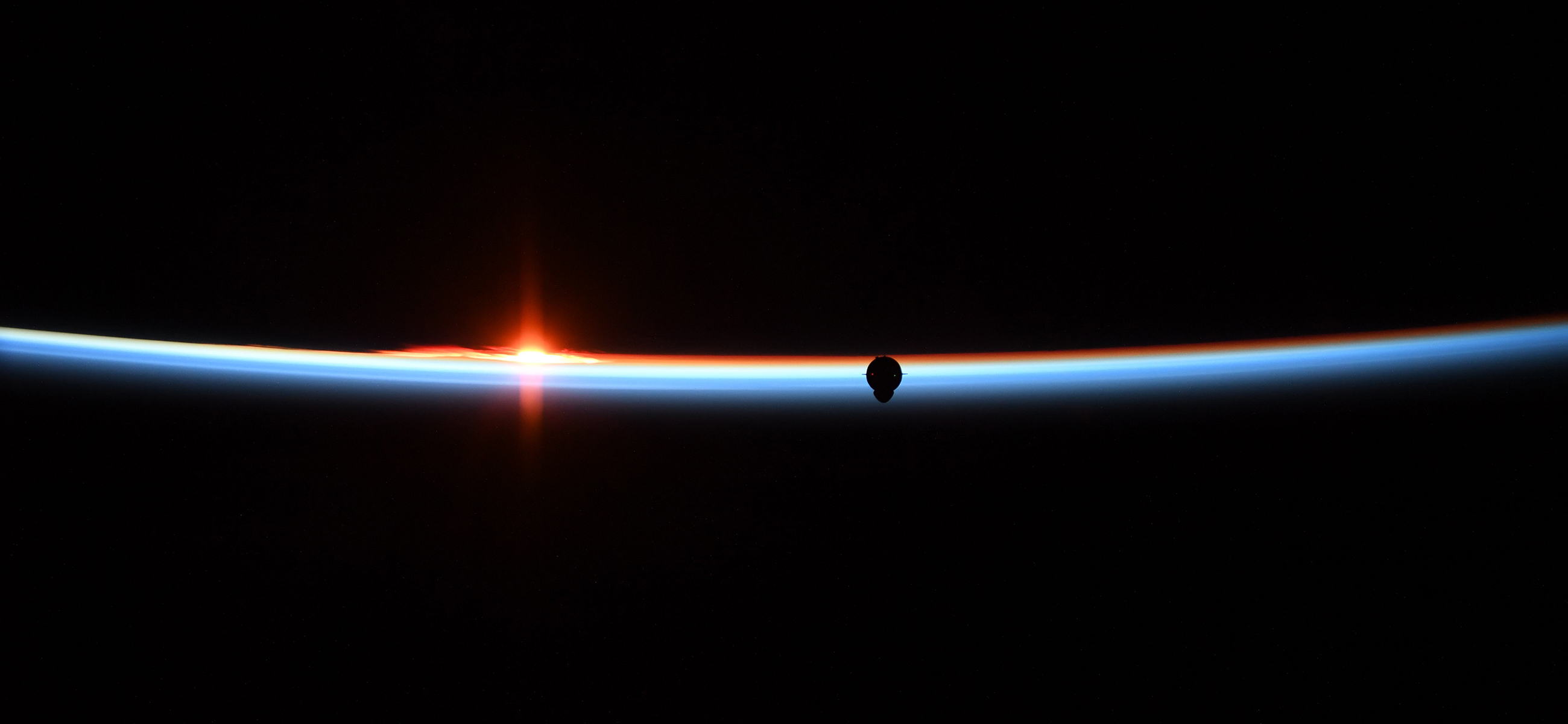Dragon is seen against the Earth's atmosphere