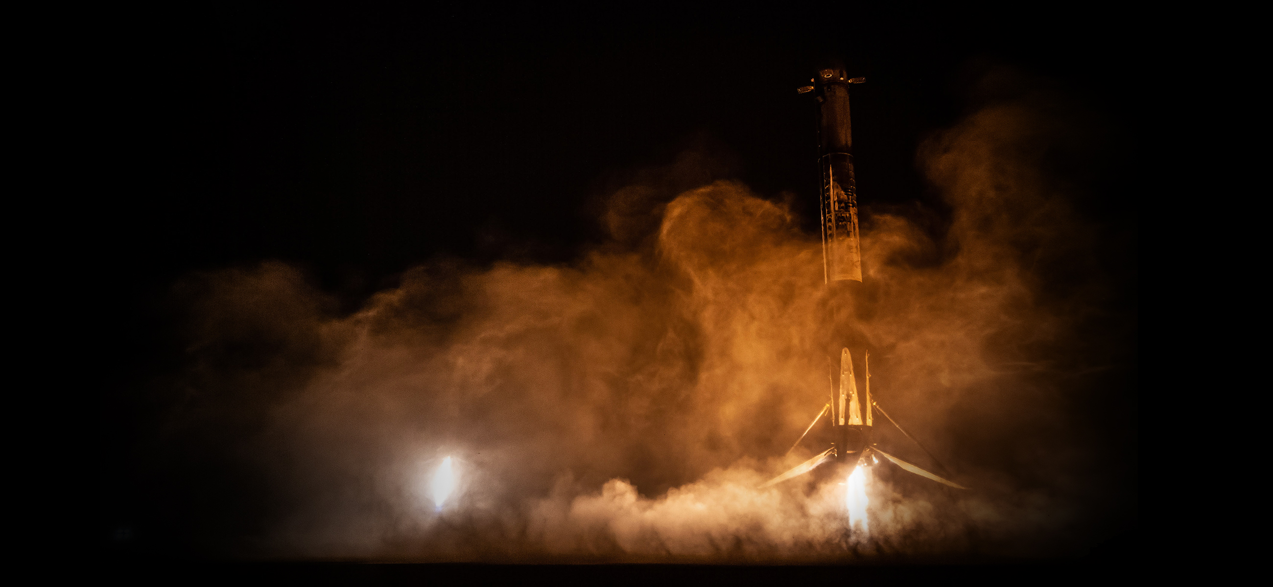Falcon Heavy's side boosters land at LZ-1 and LZ-2 at Cape Canaveral