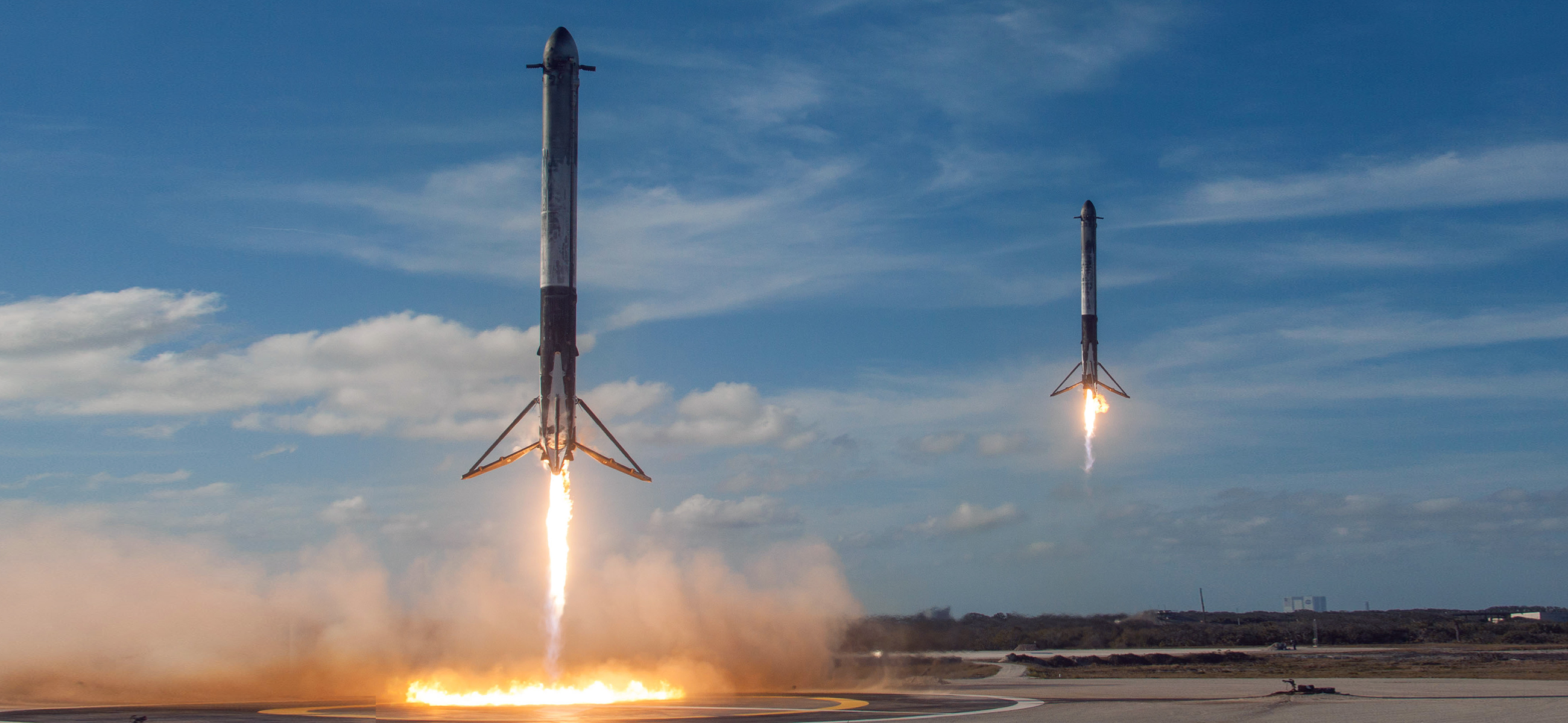 Falcon Heavy's side boosters land at LZ-1 and LZ-2 at Cape Canaveral